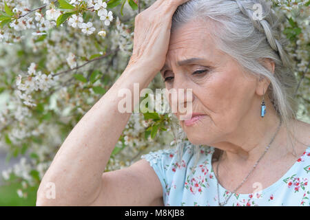 sad senior woman Stock Photo