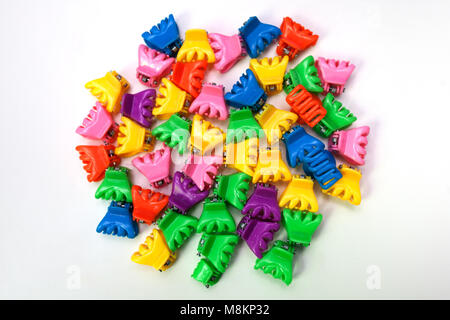 colorful hair clips on white background Stock Photo