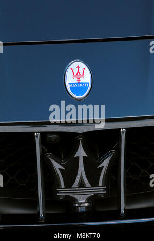 Monte-Carlo, Monaco - March 17, 2018:  Shining Maserati Logos (Emblem) on The Blue Car Hood at Monte-Carlo, Monaco. Closeup View Stock Photo