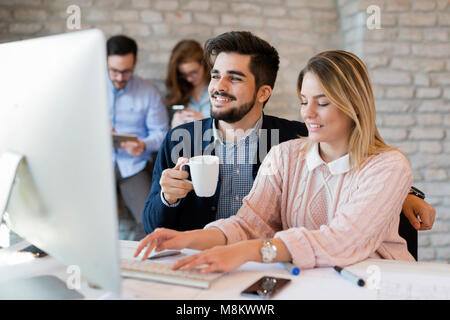 Company employees working in office Stock Photo