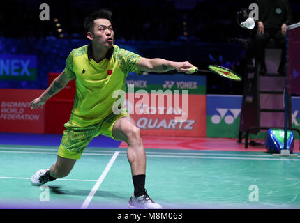 Birmingham. 18th Mar, 2018. Lin Dan of China returns the shot during the men's singles final with his compatriot Shi Yuqi at All England Open Badminton Championships 2018 in Birmingham, Britain on March 18, 2018. Credit: Han Yan/Xinhua/Alamy Live News Stock Photo