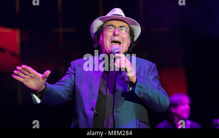 18 March 2018, Germany, Hamburg: Italian singer Al Bano appearing in a sport hall in Hamburg to begin his farewell tour. Photo: Daniel Reinhardt/dpa Stock Photo