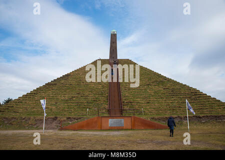 Austerlitz,holland, 18-03-2018: Unidentified people climbing the pyramid of Auteritz, the pyramis is the highest point ot this part in holland and 1804 built as a tribute to Napoleon Bonaparte Stock Photo