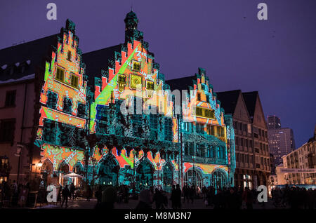 18 March 2018, Germany, Frankfurt am Main: Light installation 'Frankfurt Fades' by artist Philipp Geist at the Roemer, as part of the 'Luminale'. The illuminations run until 23 March in Frankfurt and Offenbach. Photo: Boris Roessler/dpa Stock Photo