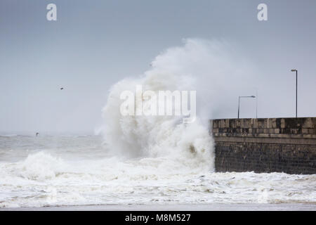 Ramsgate, Kent, UK 18th March, 2018. A giant wave crashes into the harbour arm. Sue Holness Credit: Sue Holness/Alamy Live News Stock Photo