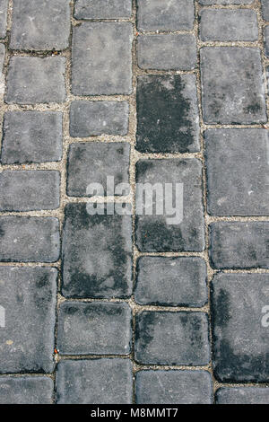 Background. Gray brick road after rain. Pattern. Stock Photo