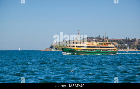 the Manly Ferry Service MV Freshwater ploughing Sydney's North Harbour enroute to Manly, against the backdrop of South Head, New South Wales, Australi Stock Photo