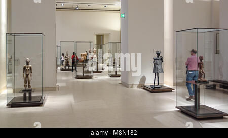 Dec 31, 2017 - Paris France Interior 'Louvre Museum' Tourists Visiting 'African Asian Oceanic and American Arts' Gallery Culture Sculpture Stock Photo