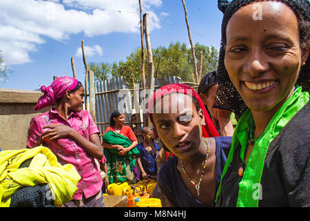 Women waiting to obtain water from the well in Ethiopia. In rural areas women and children walk up to six hours to have to have drinking water © Ciufo Stock Photo