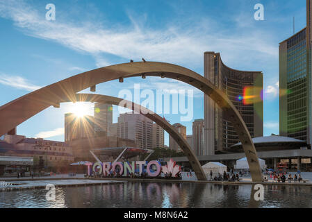 Toronto sign at sunset in Nathan Phillips Square, Toronto, Canada. Stock Photo