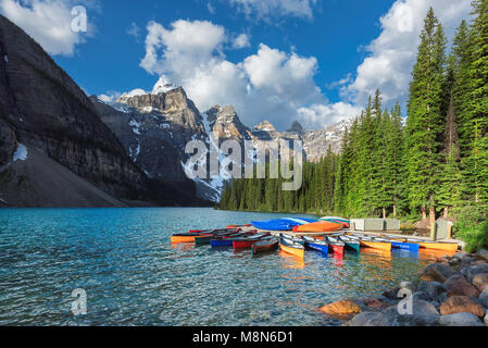 Canoes on Moraine lake in Rocky Mountains, Banff National Park, Canada. Stock Photo
