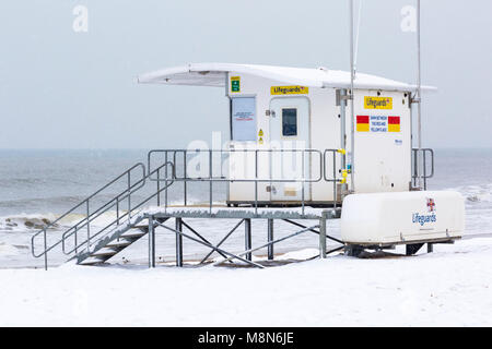 RNLI lifeguards kiosk on Bournemouth beach covered in snow at Bournemouth, Dorset, England UK in March Stock Photo