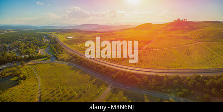 Aerial panorama of beautiful countryside at sunset in Canberra, Australia Stock Photo