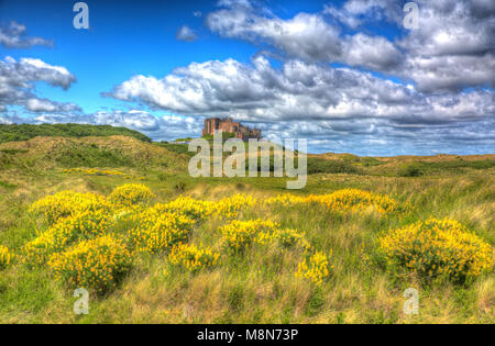 Bamburgh Castle Northumberland north east England medieval fort on hill in hdr Stock Photo