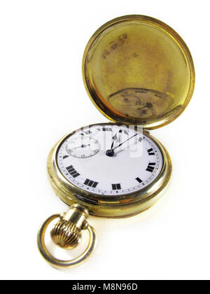 Watch face of an antique gold hunter pocket watch Stock Photo