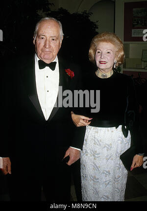 Washington, DC., USA, November 16, 1988 Walter Annenberg and his wife Leonore arrive at the White House for the State Dinner in Honor of Mararet Thatcher. Credit: Mark Reinstein/MediaPunch Stock Photo