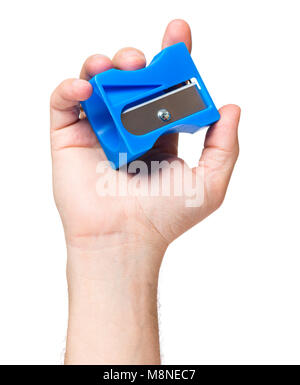 Male hand holding big blue sharpener pencil, isolated on white background. Stock Photo