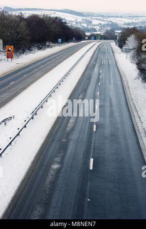 The A30, near Okehampton in Devon, which was hit by 'significant snow' overnight, Devon and Cornwall Police said, with conditions 'changing rapidly from passable to impossible'. Some 64 miles of road between the M5 at Exeter and the A38 at Bodmin were shut as a result while officers and Highways England cleared the route. Stock Photo