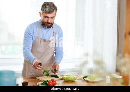 Handsome Man Cooking Stock Photo