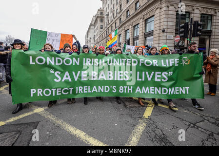 London Irish United for Life anti abortion protesters taking part in St. Patrick's Day Parade London 2018. Save babies' lives. Protect 8th amendment