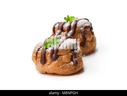 Belgian  chocolate choux buns isolated on white Stock Photo