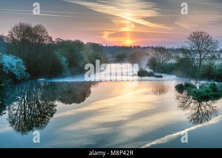 Sunrise over the River Stour from the Eye Bridge, Wimborne, Dorset, UK Stock Photo