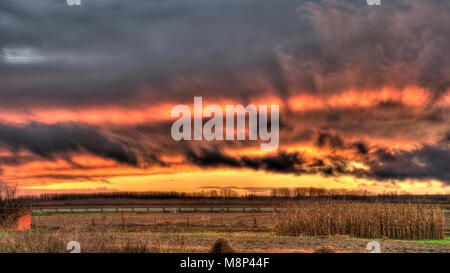 After the storm was this dramatic sky and clouds with very bright colors in orange and red in Leon (Spain). 2016 photo. Stock Photo