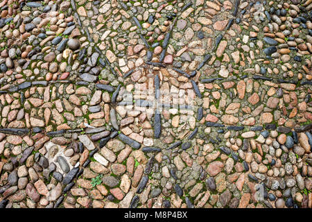 Pebble stone alley, road in Vila Vella - Old Town of Tossa de Mar in Catalonia, Spain Stock Photo