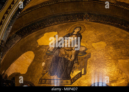 Byzantine mosaic of Virgin Mary and baby Jesus Christ in the Hagia Sofia temple gilded apse, Istanbul, Turkey Stock Photo