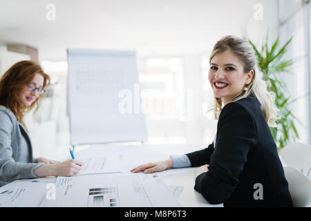 Successful company with happy workers Stock Photo