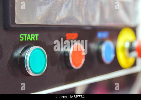 buttons for switching on and off the industrial electrical equipment. Stock Photo