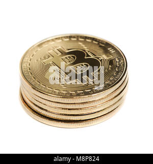 closeup of a pile of bitcoins on a white background Stock Photo
