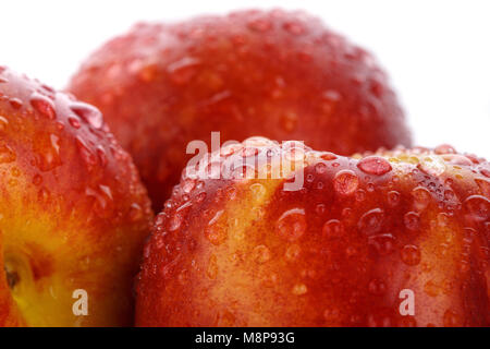 Peach. Wet fruits head isolated on white Stock Photo