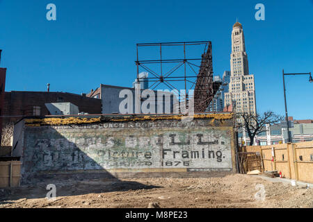 Remains of advertising are seen on a wall during the demolition of a building on Flatbush Avenue in the Prospect Heights neighborhood of Brooklyn in New York on Sunday, March 18, 2018. (Â© Richard B. Levine) Stock Photo