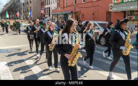 A marching band from Bishop Kearny High School celebrates St. Patrick's Day at the 43rd Annual Irish-American Parade in the Park Slope neighborhood of Brooklyn in New York on Sunday, March 18, 2018. The family friendly event in the family friendly Park Slope neighborhood attracted hundreds of families as onlookers and marchers as it wound its way through the Brooklyn neighborhood. New York has multiple St. Patrick's Day Parades, at least one in each of the five boroughs. (© Richard B. Levine)