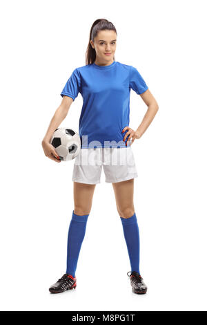 Full length portrait of a female soccer player with a football isolated on white background Stock Photo