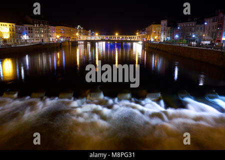 Epinal Moselle River and Bridge Night Shot with Long Expose Stock Photo