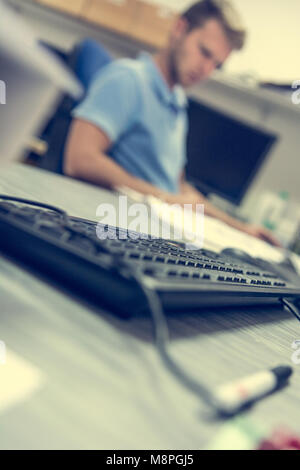 Closeup on keyboard in office. Stock Photo