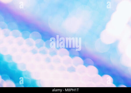 Holographic foil background with trendy holo color style and sparkly bokeh light effect. Hologram glitch. Multicolor wallpaper. Stock Photo