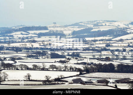 Pilsdon, Dorset, UK.  19th March 2018.  UK Weather.  View across a snow covered Marshwood vale from Pisdon Pen in Dorset looking South towards Colmers Hill in the distance.  Picture Credit: Graham Hunt/Alamy Live News. Stock Photo