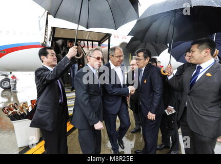 Tokyo, Japan. 20th Mar, 2018. Japan's Minister of Economy, Trade, and Industry Hiroshige Seko welcomes Russia's Foreign Minister Sergei Lavrov and Russian Ambassador to Japan Mikhail Galuzin (R-L in the middle) at Haneda International Airport. Alexander Shcherbak/TASS Credit: ITAR-TASS News Agency/Alamy Live News