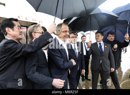 Tokyo, Japan. 20th Mar, 2018. Japan's Minister of Economy, Trade, and Industry Hiroshige Seko welcomes Russia's Foreign Minister Sergei Lavrov (R-L in the middle) at Haneda International Airport. Alexander Shcherbak/TASS Credit: ITAR-TASS News Agency/Alamy Live News
