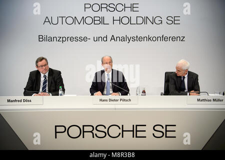 Stuttgart, Germany. 20 March 2018, Manfred Doess (l-r), member of the board at Porsche SE, Hans Dieter Poetsch, chairman of the executive board of Porsche SE, and Matthias Mueller, CEO of Volkswagen AG, pictured during the annual results press conference of Porsche SE. Photo: Marijan Murat/dpa Credit: dpa picture alliance/Alamy Live News Stock Photo