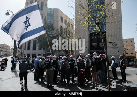 Jerusalem, Israel. 20th March, 2018. Jewish activists march in the path of the April 13th, 1948 convoy of doctors, nurses and medical supplies to besieged Hadassah Hospital on Mount Scopus, marking 70 years (Hebrew calendar) to the Arab convoy ambush and massacre of 78 people in the Arab neighborhood of Sheikh Jarrah. Credit: Nir Alon/Alamy Live News Stock Photo