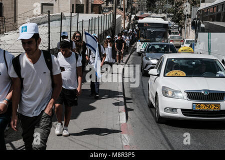 Jerusalem, Israel. 20th March, 2018. Jewish activists march in the path of the April 13th, 1948 convoy of doctors, nurses and medical supplies to besieged Hadassah Hospital on Mount Scopus, marking 70 years (Hebrew calendar) to the Arab convoy ambush and massacre of 78 people in the Arab neighborhood of Sheikh Jarrah. Credit: Nir Alon/Alamy Live News Stock Photo