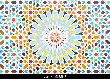 Arabic zellige mosaic wall tiles in geometric pattern on mosque wall Stock Photo