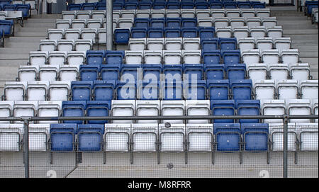 empty stadium seats making up the letter A in blue and white before a match in castletownshend, west cork, ireland. Stock Photo