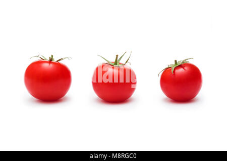 Three Fresh Red Cherry Tomatoes Isolated on White Stock Photo