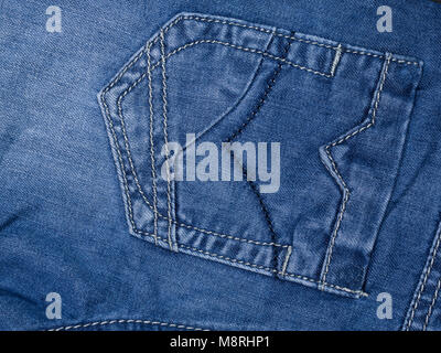 View of textured blue jeans from the back pocket Stock Photo