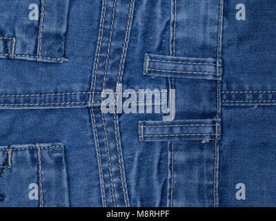 View of textured blue jeans from the back pocket Stock Photo